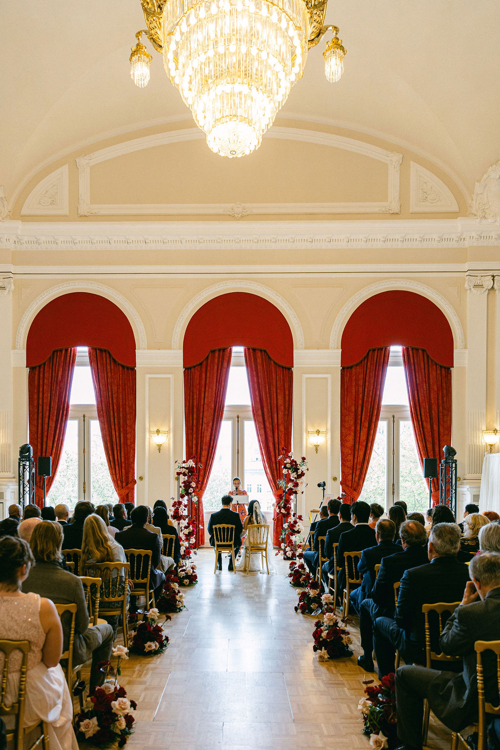 Bride and groom exchanging vows at Cercle Cité wedding in Luxembourg City