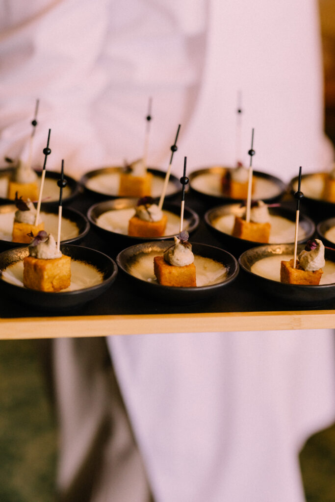 Elegant canapés being served during the wedding cocktail hour at Château du Bois d'Arlon Belgium